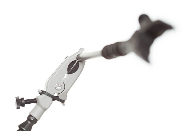 Close-up of the clamp showing the circular notch for holding the extension arm while allowing for sliding it back and forth and rotating it