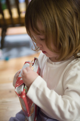 Child opening a Christmas present