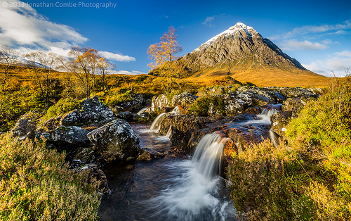 Autumn landscape photo where a polarising filter was used to reduce the shutter speed, helping to smooth the movement in waterfalls