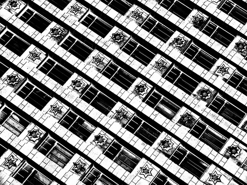 Abstract photo of the repeated pattern of windows on a building