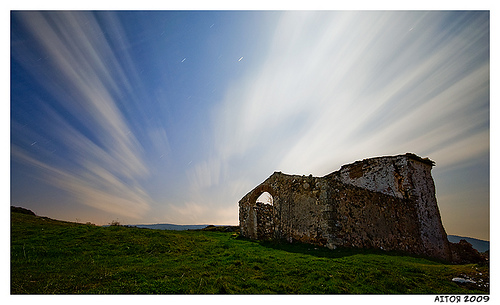 Long exposure of cloud movement over an abandoned building