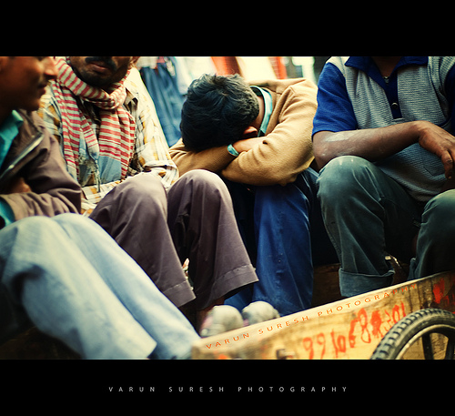 Eyes Wide Shut - Delhi street photography shot from the hip