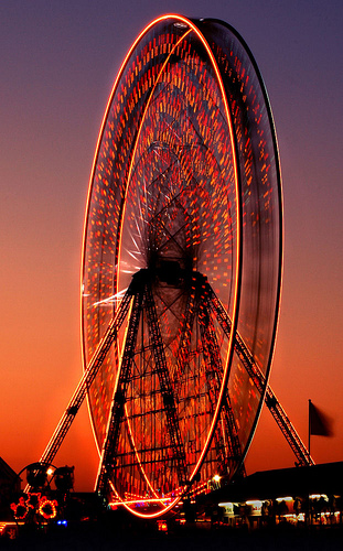 Fatal Attraction! - Moving Ferris Wheel captured at twlight