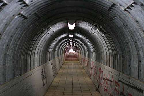 Photo looking along a tunnel using a centered composition