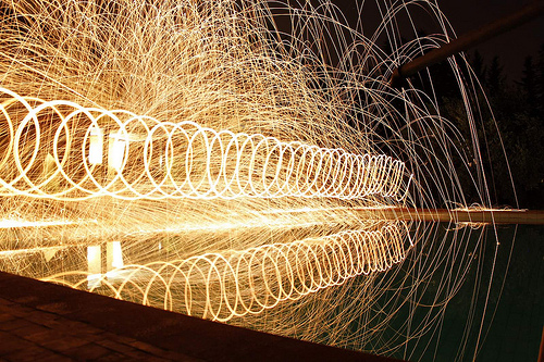 Psychic ray - burning steel wool spun while walking along the edge of a pool