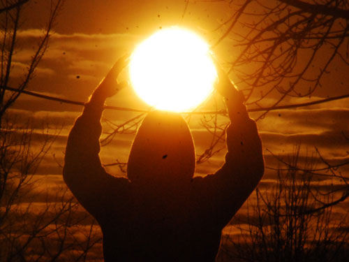holding the sun trick perspective photo
