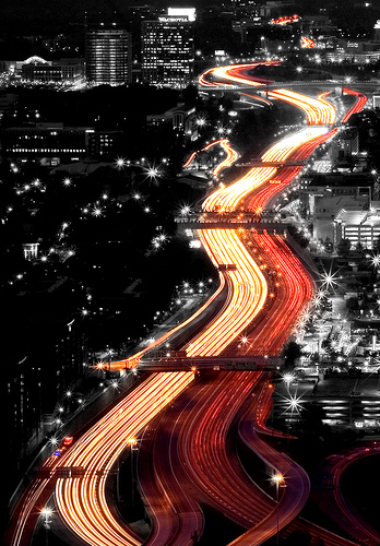 Light trails along the highway selective color photo