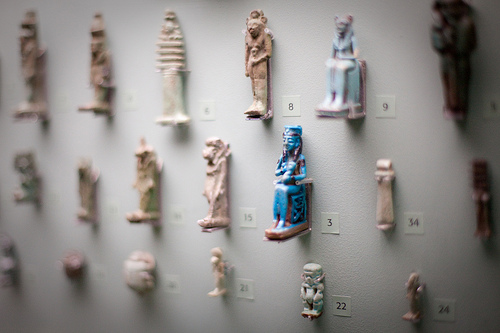 Photo of artifacts in museum, large paerture used to give shallow depth of field and compensate for low light levels