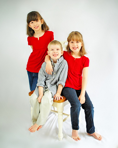 Kids on white - family studio portrait