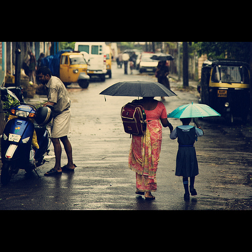 People wit umbrellas on a rainy day... | EXPLORED - Front Page