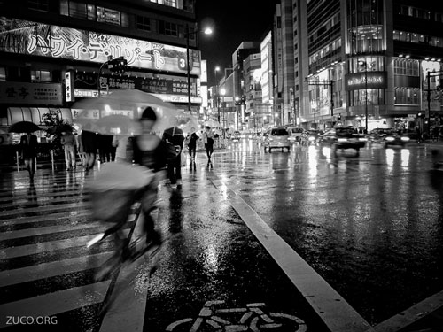 Street photography - wet city streets at night on a rainy evening