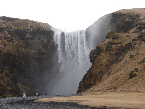 Skogarfoss, Iceland - people in the image show how large the falls are