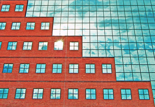 Brick and glass architectural photograph shot with a compact camera