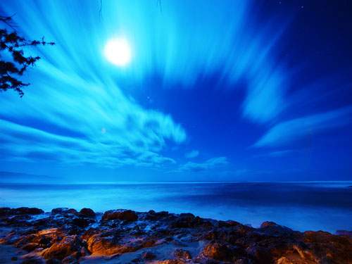 Blurred clouds seascape at night