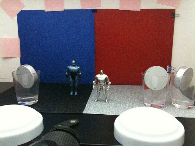 RoboCop vs. Cyborg action figure tabletop photography setup