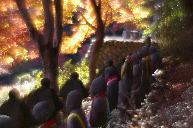 Arhat statues and glowing fall trees in Japan photographed using a Pentax 85mm f/2.2 Soft Focus lens