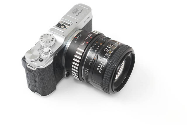 50mm Nikon F mount lens mounted on a Fuji X mount camera using an adapter