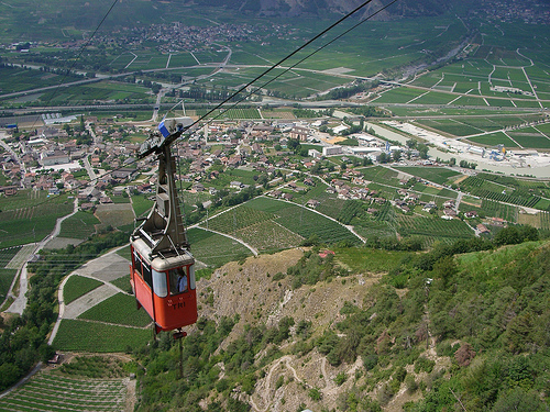 Cable car traveling up a mountain