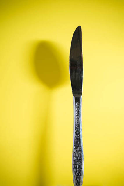 Knife that appears to have the shadow of a spoon