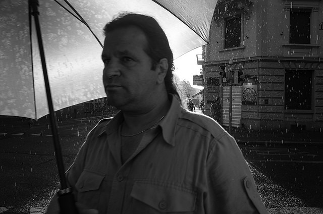 Street photography portrait - summer rain