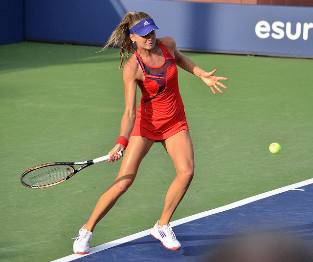 2013 US Open (Tennis) - Daniela Hantuchova, about to hit the ball