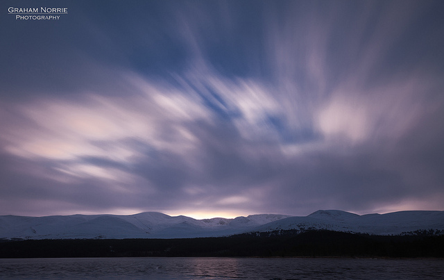 Cairngorm Sunrise - a long exposure was used, causing the moving clouds to be blurred in the captured image