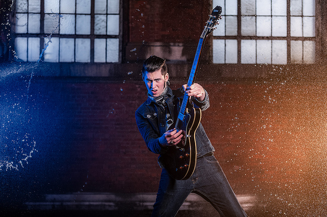 Guitar player and water splashes, lit by elinchrom studio strobes