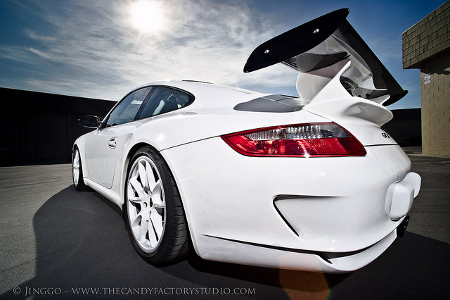 Porshe 911 GT3, studio strobes used to light the shadow side of the car and overpower the sun