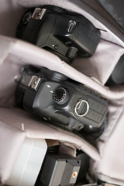 Two camera bodies packed in camera bag