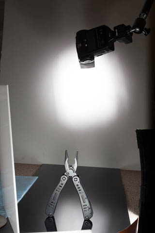 Setup shot showing position of reflected highlight on plexiglass when camera is positioned at a low angle.