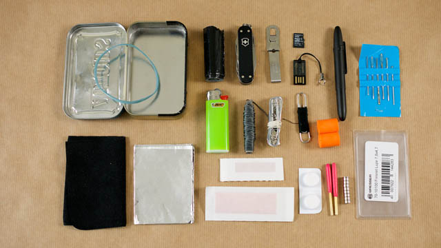 Altoids tin survival kit knolling photo