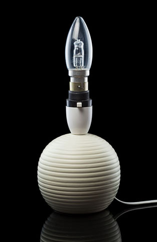 Photo of a lamp lit using off-camera flash from angles away from the camera. The lamp has shadow and highlight areas due to the directional lighting, bringing out its form.