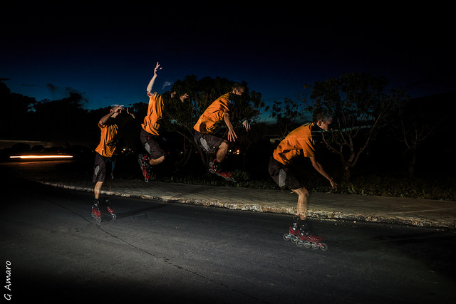 Sequence of rollerblade jump lit using stroboscopic flash